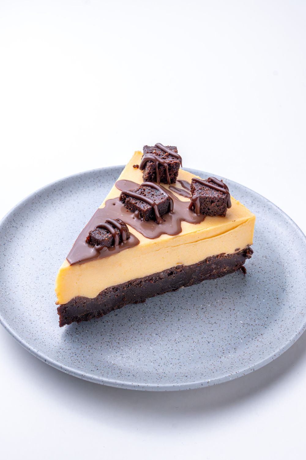 Cheesecake con base de brownie de Caneli Café